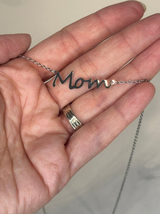 Silver script ‘Mom’ necklace on a delicate chain